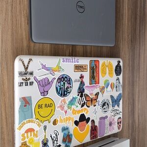 Dell Laptop with Colorful Stickers